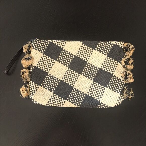 A New Day black & tan woven clutch bag with side pom-poms. - Picture 1 of 4